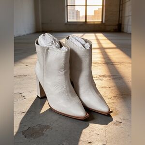 ThisKaanas Mizar booties in ivory with a snakeskin texture